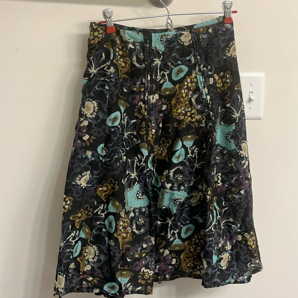Black cotton / silk blend, fully lined skirt.